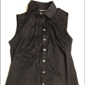 Sleeveless button down top in black.